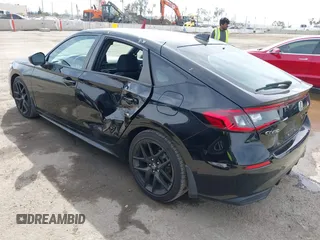 2023 Honda Civic Sport z VIN 19XFL2H89PE001737, wystawiony jako IAAI lot #41689390 z przebiegiem 24 869 mil mil oraz . Historia ofert i sprzedaży dostępna na DreamBid. Obrazek 3.