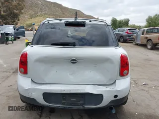 2015 MINI Countryman with VIN WMWZB3C57FWR46707, listed as a IAAI auction lot 42114457 with 137,356 mi miles and . Bid and sale history available at DreamBid. Image 16.