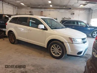 2013 Dodge Journey SXT with VIN 3C4PDCBG6DT530254, listed as a IAAI auction lot 42591488 with 201,711 mi miles and . Bid and sale history available at DreamBid. Image 1.