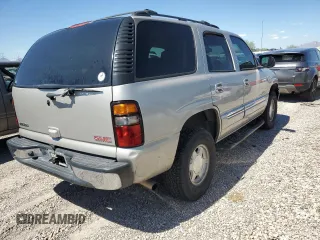 2004 GMC Yukon SLE with VIN 1GKEC13V34R204520, listed as a Copart auction lot 71552534 with 295,316 mi miles and Salvage Title. Bid and sale history available at carsss.com. Image 3.