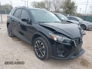 2016 Mazda CX-5 Grand Touring with VIN JM3KE2DY0G0651300, listed as a IAAI auction lot 41678833 with 98,790 mi miles. Bid and sale history available at carsss.com. Image 1.