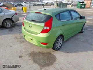 2012 Hyundai Accent GS with VIN KMHCT5AE9CU039285, listed as a IAAI auction lot 41543320 with 73,564 mi miles. Bid and sale history available at carsss.com. Image 4.