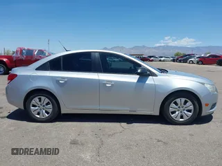 2014 Chevrolet Cruze LS z VIN 1G1PA5SH6E7448472, wystawiony jako IAAI lot #42428958 z przebiegiem 105 872 mil mil oraz . Historia ofert i sprzedaży dostępna na DreamBid. Obrazek 13.
