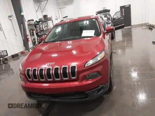 2015 Jeep Cherokee Latitude with VIN 1C4PJLCB6FW616477, listed as a IAAI auction lot 41812431 with 131,234 mi miles. Bid and sale history available at carsss.com. Image 13.