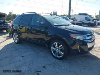 2012 Ford Edge SEL with VIN 2FMDK3J92CBA32697, listed as a IAAI auction lot 42036887 with 180,858 mi miles. Bid and sale history available at carsss.com. Image 1.