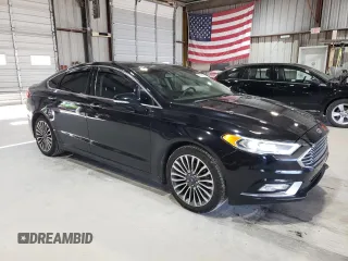 2018 Ford Fusion Titanium с VIN 3FA6P0D9XJR241506, выставлен на аукционе Copart как лот 60736525 с пробегом 109 548 миль миль и Списание • Salvage title. История ставок и продаж доступна на DreamBid. Изображение 4.
