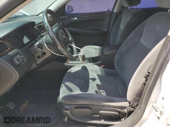 2014 Chevrolet Impala LS with VIN 2G1WA5E31E1129148, listed as a Copart auction lot 59816755 with 159,757 mi miles and Clean title. Bid and sale history available at DreamBid. Image 7.