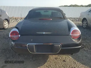 2005 Ford Thunderbird Deluxe z VIN 1FAHP60A45Y103477, wystawiony jako Copart lot #71405074 z przebiegiem 84 866 mil mil oraz Czysty tytuł • Clean title. Historia ofert i sprzedaży dostępna na DreamBid. Obrazek 6.