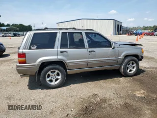 1998 Jeep Grand Cherokee Limited with VIN 1J4GZ88Z9WC148445, listed as a Copart auction lot 65961744 with 180,067 mi miles and Clean Title. Bid and sale history available at carsss.com. Image 3.