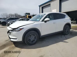 2021 Mazda CX-5 Touring z VIN JM3KFBCM9M1386068, wystawiony jako Copart lot #51735225 z przebiegiem 68 728 mil mil oraz Szkoda całkowita • Salvage title. Historia ofert i sprzedaży dostępna na DreamBid. Obrazek 1.