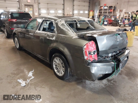 2010 Chrysler 300 Touring with VIN 2C3CA5CV9AH101800, listed as a IAAI auction lot 42015640 with 128,457 mi miles and . Bid and sale history available at DreamBid. Image 3.