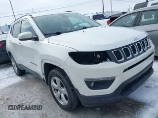 2019 Jeep Compass Latitude with VIN 3C4NJDBB0KT813014, listed as a IAAI auction lot 41560221 with 63,307 mi miles. Bid and sale history available at carsss.com. Image 1.