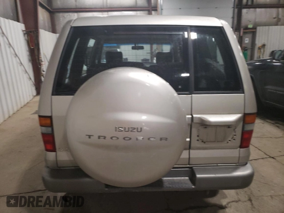1999 Isuzu Trooper S z VIN JACDJ58X8X7915370, wystawiony jako Copart lot #83466824 z przebiegiem 143 588 mil mil oraz Czysty tytuł • Clean title. Historia ofert i sprzedaży dostępna na DreamBid. Obrazek 6.