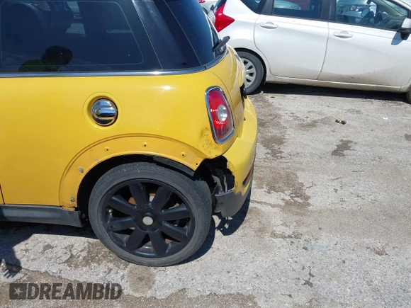 2009 MINI Hardtop S with VIN WMWMF73579TW86675, listed as a IAAI auction lot 42459385 with 129,264 mi miles and . Bid and sale history available at DreamBid. Image 6.