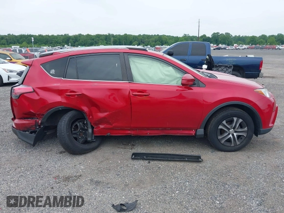 2017 Toyota RAV4 LE with VIN JTMBFREV8HJ161427, listed as a IAAI auction lot 42333851 with 121,161 mi miles and . Bid and sale history available at DreamBid. Image 13.