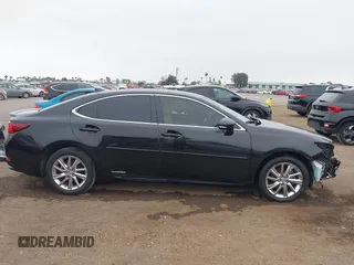 2016 Lexus ES 300h z VIN JTHBW1GG0G2108888, wystawiony jako IAAI lot #42359607 z przebiegiem 119 473 mil mil oraz . Historia ofert i sprzedaży dostępna na DreamBid. Obrazek 14.