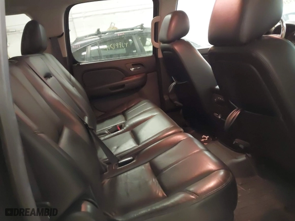 2013 Chevrolet Suburban LT with VIN 1GNSKJE75DR167705, listed as a IAAI auction lot 41521409 with 228,411 mi miles. Bid and sale history available at carsss.com. Image 8.