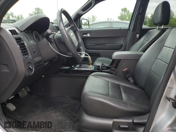 2010 Ford Escape Limited with VIN 1FMCU0EG9AKA54244, listed as a Copart auction lot 56930955 with 88,496 mi miles and Salvage title. Bid and sale history available at DreamBid. Image 7.
