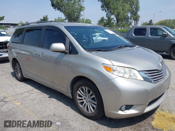 2015 Toyota Sienna XLE with VIN 5TDYK3DC4FS560743, listed as a IAAI auction lot 42488745 with 145,009 mi miles and . Bid and sale history available at DreamBid. Image 1.