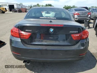 2015 BMW 4 Series 428i xDrive z VIN WBA3T1C57FP820896, wystawiony jako Copart lot #62681495 z przebiegiem 147 357 mil mil oraz Szkoda całkowita • Salvage title. Historia ofert i sprzedaży dostępna na DreamBid. Obrazek 6.