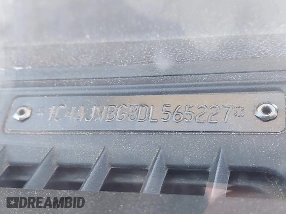 2013 Jeep Wrangler Sahara with VIN 1C4AJWBG8DL565227, listed as a IAAI auction lot 41987087 with 90,644 mi miles and . Bid and sale history available at DreamBid. Image 9.
