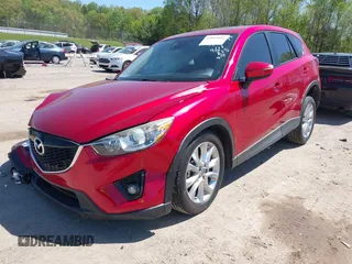 2015 Mazda CX-5 Grand Touring with VIN JM3KE4DY5F0469439, listed as a IAAI auction lot 42053851 with 70,676 mi miles. Bid and sale history available at carsss.com. Image 17.
