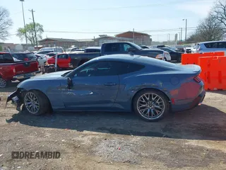 2024 Ford Mustang EcoBoost with VIN 1FA6P8TH1R5135645, listed as a IAAI auction lot 41936457 with 10,871 mi miles. Bid and sale history available at carsss.com. Image 14.