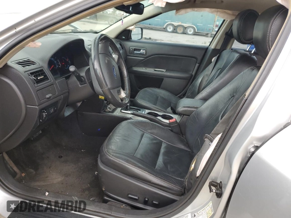 2012 Ford Fusion SEL with VIN 3FAHP0JG1CR434397, listed as a Copart auction lot 50779895 with 99,853 mi miles and Salvage title. Bid and sale history available at DreamBid. Image 7.