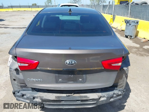 2014 Kia Cadenza Premium z VIN KNALN4D70E5152333, wystawiony jako IAAI lot #42047660 z przebiegiem 107 686 mil mil oraz . Historia ofert i sprzedaży dostępna na DreamBid. Obrazek 6.