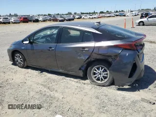 2021 Toyota Prius LE z VIN JTDKAMFPXM3190346, wystawiony jako Copart lot #57626675 z przebiegiem 102 786 mil mil oraz Szkoda całkowita • Salvage title. Historia ofert i sprzedaży dostępna na DreamBid. Obrazek 2.