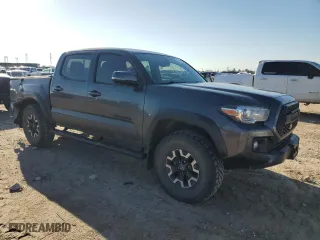 2019 Toyota Tacoma 4WD SR with VIN 3TMCZ5AN7KM287170, listed as a Copart auction lot 48313365 with 75,986 mi miles and Salvage Title. Bid and sale history available at carsss.com. Image 4.