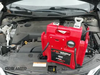 2016 Nissan Altima SR z VIN 1N4AL3AP1GN312128, wystawiony jako IAAI lot #43296337 z przebiegiem 100 688 mil mil oraz . Historia ofert i sprzedaży dostępna na DreamBid. Obrazek 12.