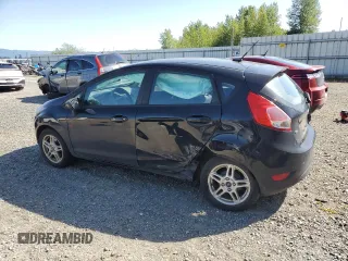 2019 Ford Fiesta SE with VIN 3FADP4EJXKM120349, listed as a Copart auction lot 54972535 with 56,084 mi miles and Salvage Title. Bid and sale history available at DreamBid. Image 2.