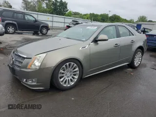 2010 Cadillac CTS Premium with VIN 1G6DS5EV3A0116911, listed as a Copart auction lot 57394905 with 126,084 mi miles and Salvage title. Bid and sale history available at DreamBid. Image 1.