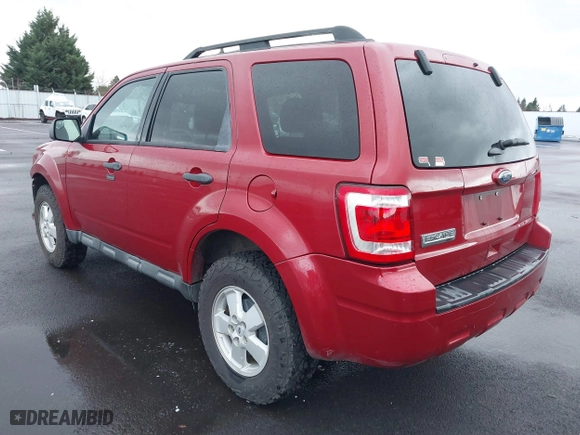 2011 Ford Escape XLT with VIN 1FMCU9D77BKB34262, listed as a IAAI auction lot 41198534 with 212,006 mi miles. Bid and sale history available at carsss.com. Image 3.