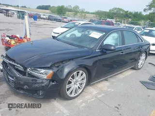 2015 Audi A8 4.0T with VIN WAU32AFD6FN002710, listed as a IAAI auction lot 42447149 with 109,791 mi miles and . Bid and sale history available at DreamBid. Image 16.