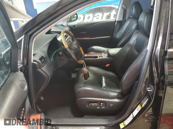 2011 Lexus RX 350 with VIN 2T2BK1BA0BC113613, listed as a Copart auction lot 56015345 with 200,586 mi miles and Salvage Title. Bid and sale history available at DreamBid. Image 7.