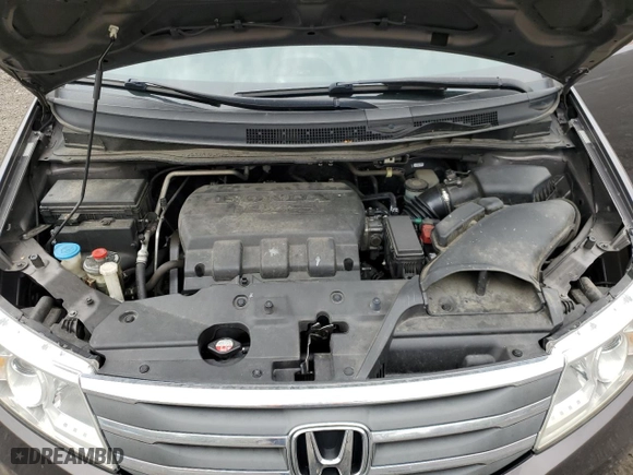 2012 Honda Odyssey EX-L with VIN 5FNRL5H62CB079729, listed as a Copart auction lot 52068685 with 181,468 mi miles and Salvage Title. Bid and sale history available at carsss.com. Image 12.