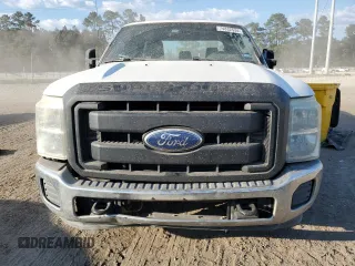 2011 Ford Super Duty F-250 SRW XL with VIN 1FT7W2AT6BEC56909, listed as a Copart auction lot 74832534 with 243,606 mi miles and Salvage Title. Bid and sale history available at carsss.com. Image 5.