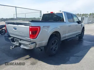 2021 Ford F-150 XL with VIN 1FTFW1E52MFC44822, listed as a IAAI auction lot 41657464 with 83,994 mi miles. Bid and sale history available at carsss.com. Image 4.