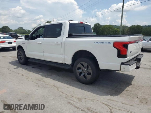 2022 Ford F-150 Lightning Pro with VIN 1FTVW1EL3NWG16146, listed as a Copart auction lot 65322785 with 68,928 mi miles and Salvage title. Bid and sale history available at DreamBid. Image 2.