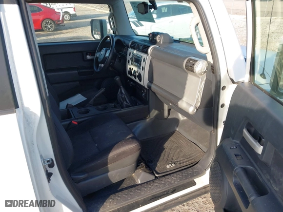 2014 Toyota FJ Cruiser with VIN JTEBU4BF1EK183485, listed as a IAAI auction lot 41185853 with 91,293 mi miles. Bid and sale history available at carsss.com. Image 5.