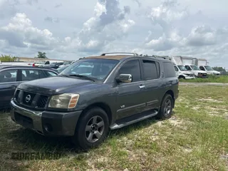 2005 Nissan Armada LE z VIN 5N1AA08A45N703735, wystawiony jako Copart lot #59034285 z przebiegiem 242 012 mil mil oraz Tytuł czysty. Historia ofert i sprzedaży dostępna na DreamBid. Obrazek 2.