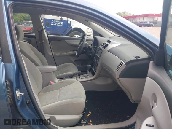 2013 Toyota Corolla L with VIN 5YFBU4EE9DP210262, listed as a IAAI auction lot 42209025 with 204,463 mi miles and . Bid and sale history available at DreamBid. Image 5.