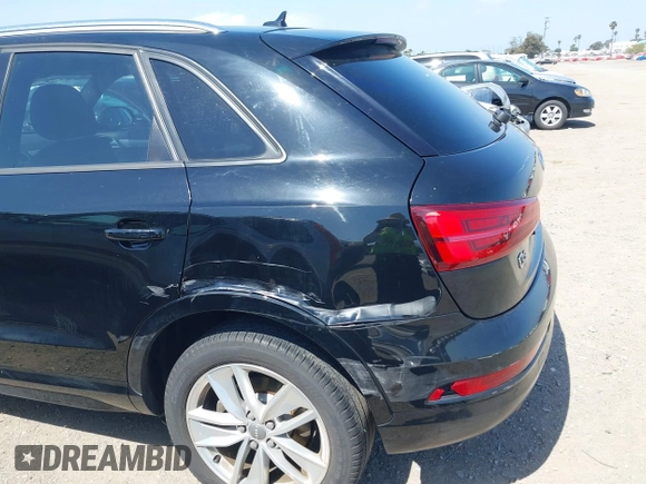 2017 Audi Q3 Premium with VIN WA1BCCFS5HR010731, listed as a IAAI auction lot 42211073 with 67,383 mi miles and . Bid and sale history available at DreamBid. Image 6.
