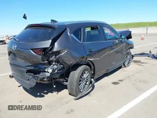 2019 Mazda CX-5 Touring with VIN JM3KFACM1K0533142, listed as a IAAI auction lot 41880181 with Not Provided miles and . Bid and sale history available at carsss.com. Image 4.