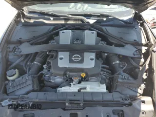 2009 Nissan 370Z Touring with VIN JN1AZ44EX9M407369, listed as a Copart auction lot 66755474 with 124,031 mi miles and Salvage Title. Bid and sale history available at carsss.com. Image 13.