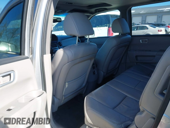 2014 Honda Pilot EX-L with VIN 5FNYF3H78EB006464, listed as a IAAI auction lot 41321137 with 198,496 mi miles and . Bid and sale history available at DreamBid. Image 8.