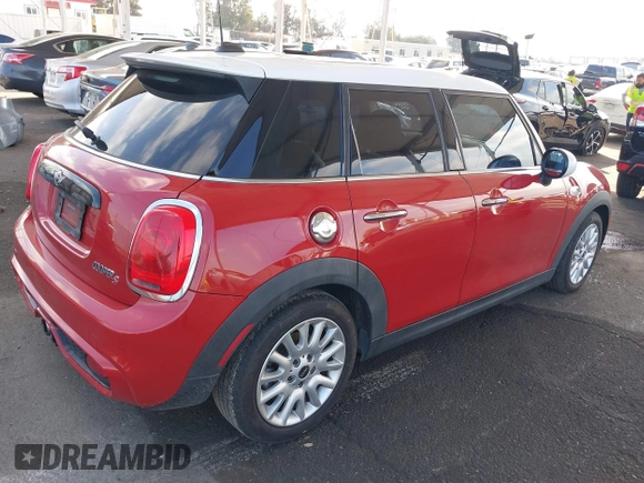 2016 MINI Cooper Hardtop 4 Door S with VIN WMWXU3C5XG2D28360, listed as a IAAI auction lot 41539607 with 78,616 mi miles. Bid and sale history available at carsss.com. Image 4.