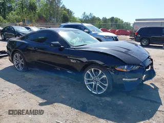 2021 Ford Mustang GT with VIN 1FA6P8CFXM5156002, listed as a IAAI auction lot 42009222 with 65,939 mi miles and . Bid and sale history available at DreamBid. Image 1.